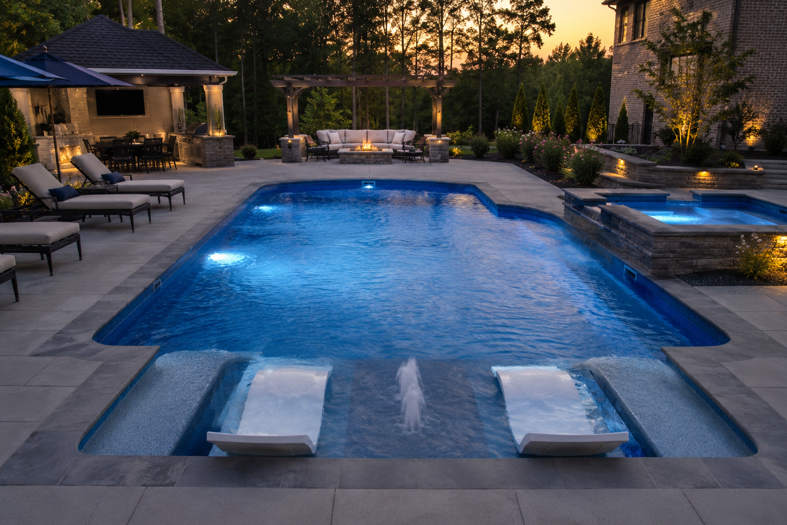 Luxury pool at twilight by High Tide